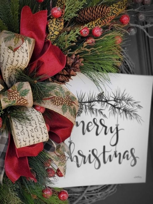 christmas wreath with Merry Christmans sign